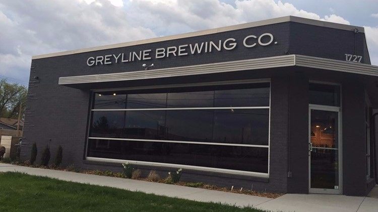 The+front+side+of+the+brewery%2C+with+its+large+windows+and+modern+sign.