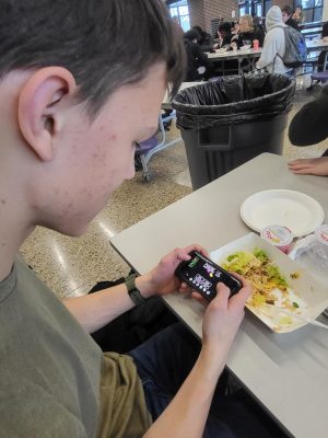 Tyler Bos decides to forgo half of his lunch in favor of playing Among Us instead.